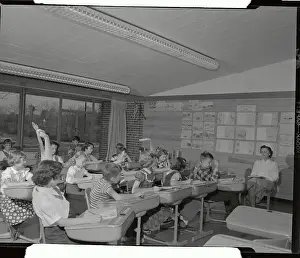 Students Raising Hands in Class at Blythe Park School