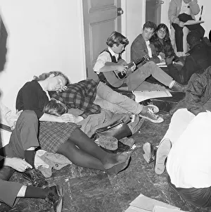Sit In Prints: Students Sleep and Play Guitar at Sit-In