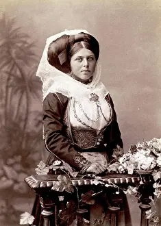 Direct Look Prints: Studio portrait of a woman in traditional Greek dress