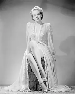 Nightgown Prints: Studio portrait of young woman in nightgown