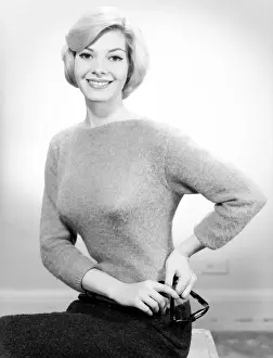 Bobbed Hair Prints: Studio portrait of young woman smiling