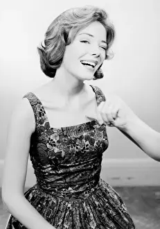 Expressing Positivity Prints: Studio portrait of young woman smiling