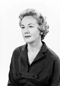 Daydreaming Prints: Studio shot of mature woman