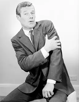 Posture Prints: Studio shot of mid adult man with facial expression