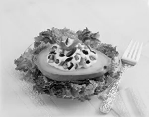Images Dated 30th July 2011: Stuffed avocado on lettuce with fork