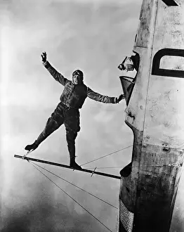 Daredevil Prints: Stunt Flier Suspended over Cockpit