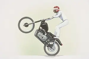 Balancing Prints: Stunt rider standing on motorbike, front wheel raised, side view