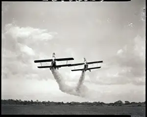 Stunt Prints: Stuntmen Ride Atop Wing of Plane