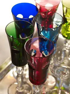 Stylish Prints: Stylish, colourful tinted champagne glasses on a silver platter