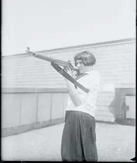 High School Prints: Sue Williams Aiming Rifle