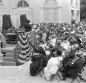 Cooperation Prints: Suffrage Gathering with Flag Draped Podium