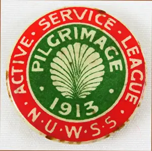 Prints of Red, green, and white, enamel pin or badge, with the text Active Service League NUWSS, Pilgrimage 1913, commemorating a march from Land's End to London Historic Moments from the Women’s Fight for the Vote: Suffrage Pilgrimage Pin