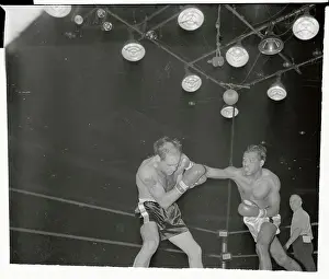 Sugar Ray Robinson and Carl Olson Boxing in the Ring