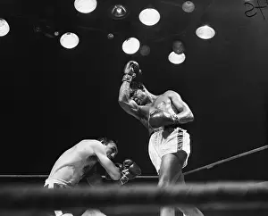 Sugar Ray Robinson and Carmen Basilio in Boxing Action
