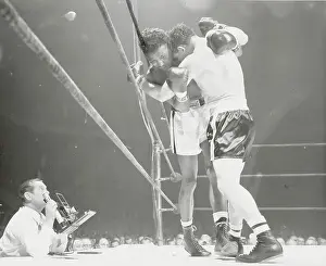 Sugar Ray Robinson and Gene Fullmer in Boxing Action