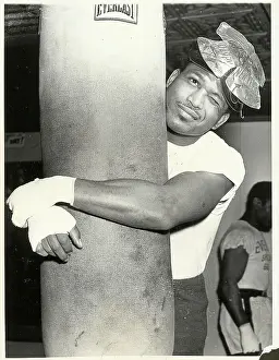 New Years Eve Prints: Sugar Ray Robinson Hugging Punching Bag