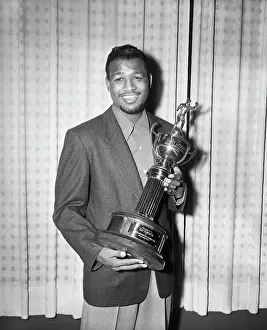 Sugar Ray Robinson Smiling with Trophy