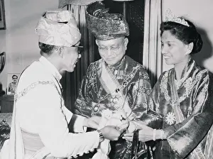Sultan of Brunie Presenting Gifts to King and Queen of Malaya