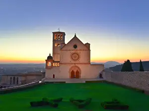In Front Of Prints: The sun sets behind St. Francis Basilica in Assisi