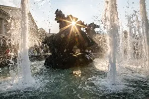 Street Culture City Life Prints: Sun is shining though the Four Seasons fountain on Manezhnaya Square in Moscow