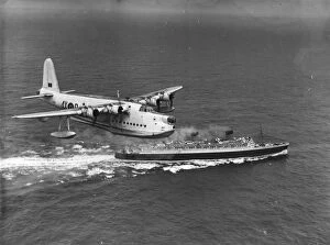 Cruise Ship Gallery: Sunderland Bomber in a mock bombing practice with the Queen Elizabeth