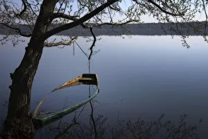 Images Dated 18th April 2010: A sunken rowing boat in the lake of Moryn, Poland, Europe