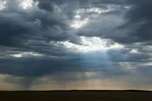 Images Dated 8th August 2011: Sunlight breaking through dark clouds near Minuteman nuclear missile site, South Dakota, USA