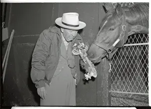 Sunny Jim Fitzsimmons Standing Next to Horse Called Nashua