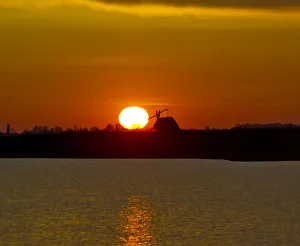 Break Of Dawn Gallery: Sunrise with drawing well at Darscho-Lacke or Warmsee Lake, Seewinkel, Apetlon, Burgenland, Austria