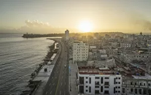 Images Dated 26th May 2015: Sunrise over Havana and the Malecon