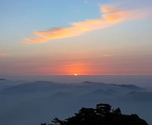 Sunrise above Mount Huangshan (Yellow Mountain or Mt. Huangshan), Anhui Province, China