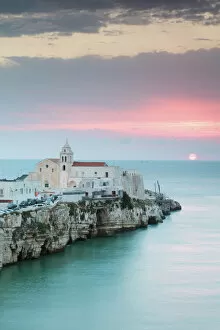 Images Dated 6th May 2017: Sunrise over old town of Vieste, Gargano, Puglia, Italy