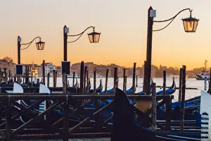 Lamp Light Street Light Prints: Sunrise view on gondola station near Piazza San Marco