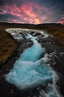 Sunset at BrA┬║arfoss waterfall in Iceland