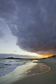 Sunset clouds and ocean surf, Australia