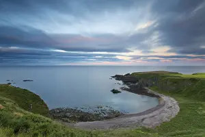 Aberdeen Prints: Sunset at Dunnottar Castle on the Scottish coast with moving cloud - Scotland Europe