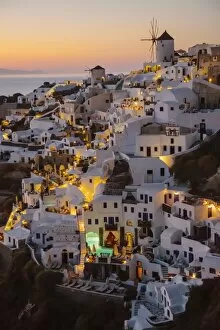 Volcano Collection: Sunset in Oia village, Santorini, Cyclades, Greece
