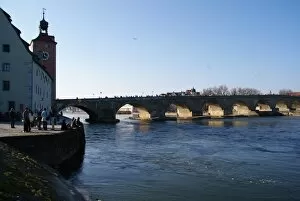 Danube River Collection: Sunset on old stone bridge in historic Regensburg