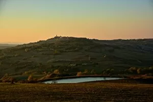 Images Dated 2nd November 2015: Sunset on Pienza from Monticchiello
