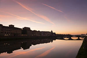 Images Dated 8th November 2015: Sunset view of River Arno with buildings along the riverbank