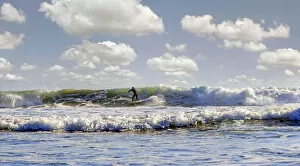 Images Dated 4th September 2012: Surfer in the surf on the Pacific beach near Cambria, California, United States