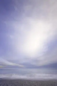 Rolling Prints: Surfing breaking on beach, dawn, (long exposure, soft)