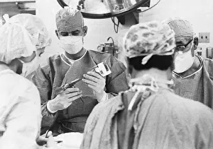 Machine Prints: Surgeon Checking A Surgical Stapler