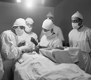 Skin Prints: Surgeon Grafting Skin Onto Neck Of Patie