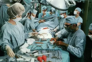Michael E Prints: Surgeons Performing Heart Transplant