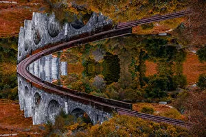Glenfinnan Viaduct Collection: Surreal picture with mirror effect of stunning bridge with Moebius effect
