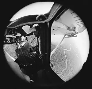 Intelligence Specialist Prints: Surveillance Airplane Above Vietnam Delta