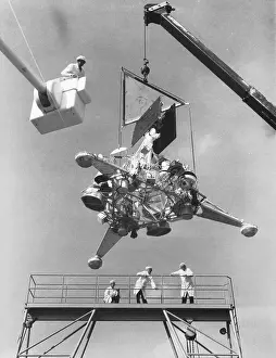 Surveyor 7 Spacecraft Hung by a Crane