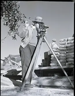 Measuring Prints: Surveyor Looking Through Instrument