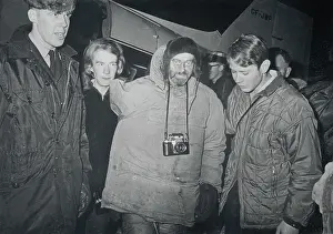 Survivor Arriving from Plane Crash Site After Rescue